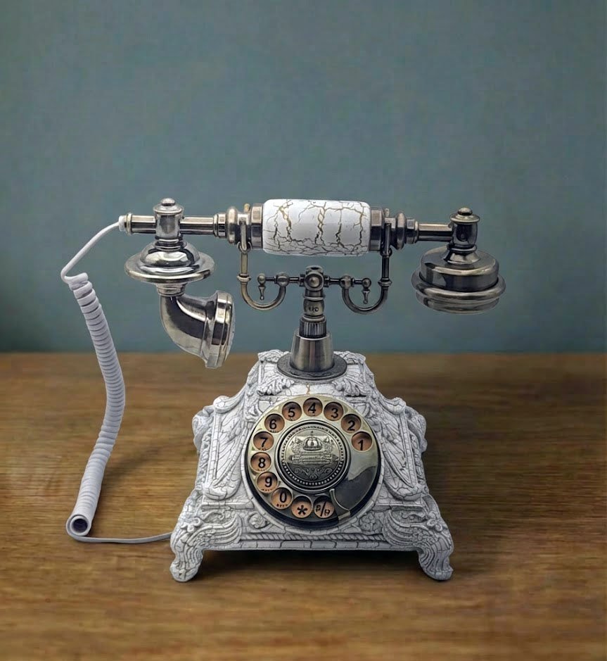 Téléphone blanc antique